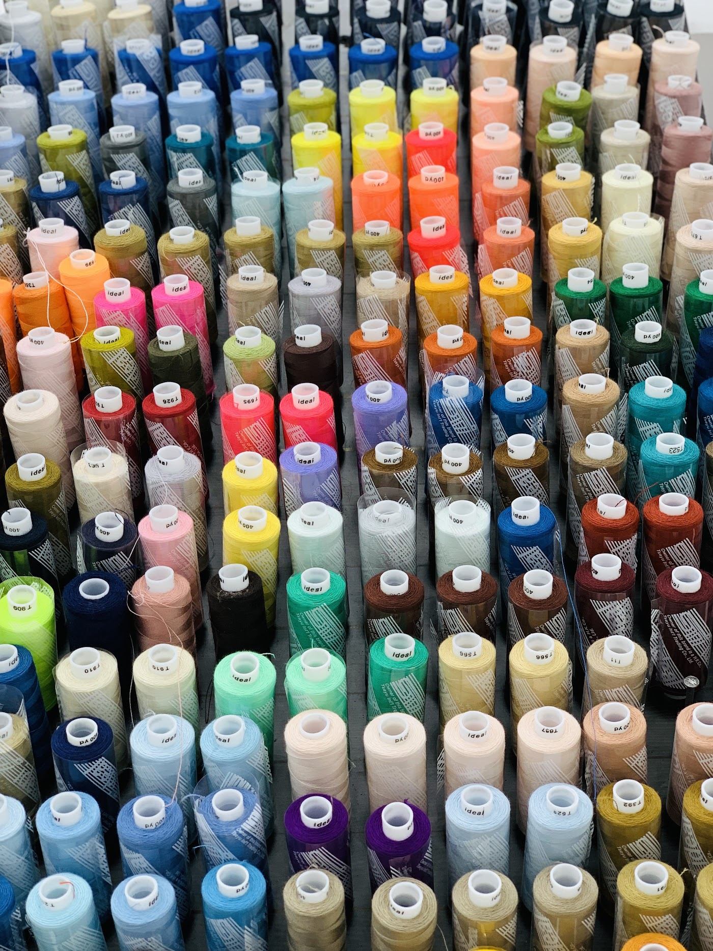 Hundreds of thread spools in every colour at Best Land Tailoring